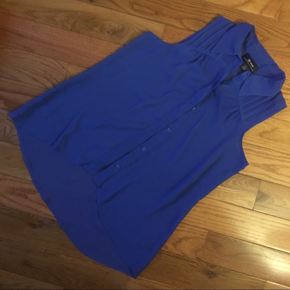 Blue sleeveless high low blouse